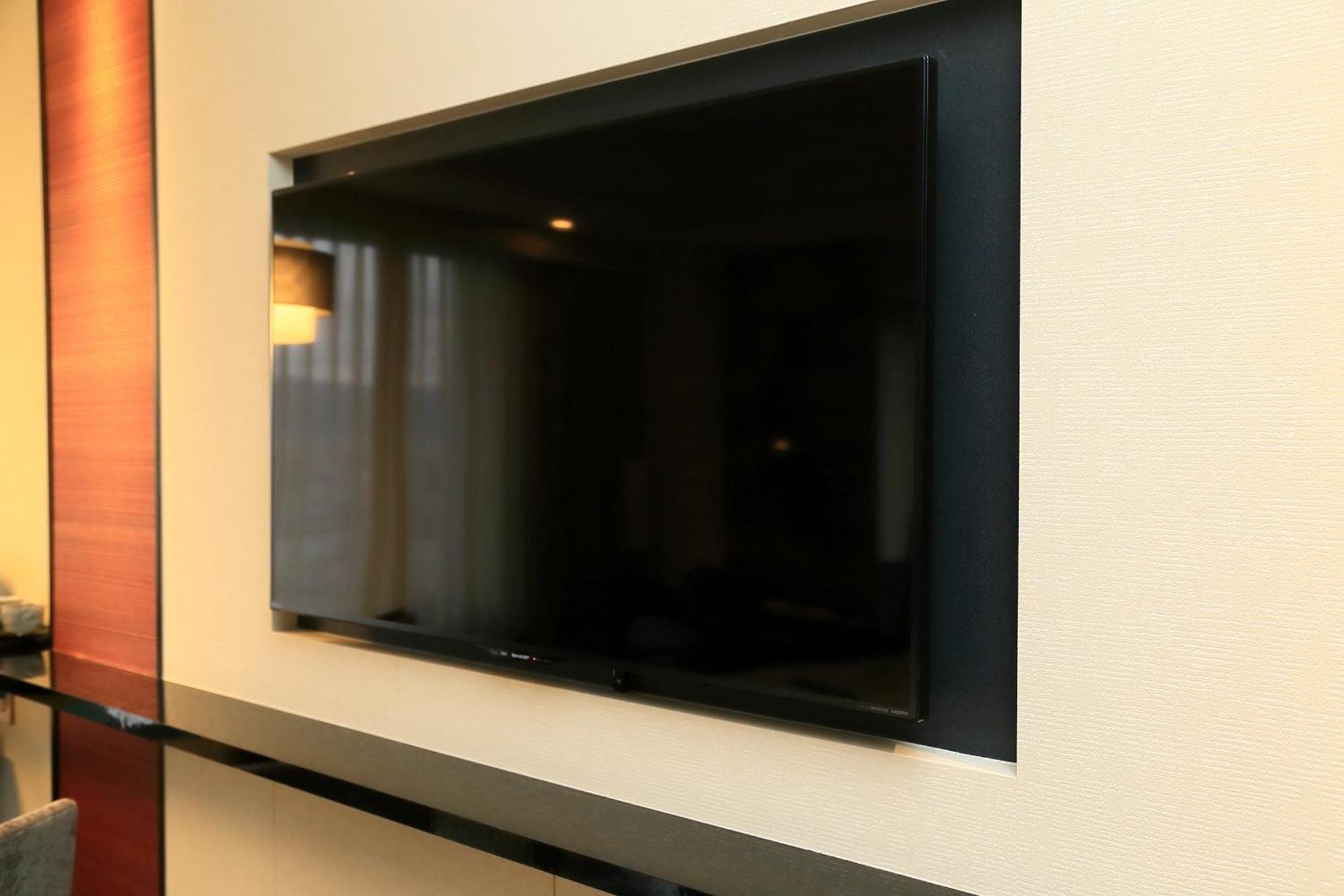 Hotel Granvia Киото Стая снимка A wall-mounted television